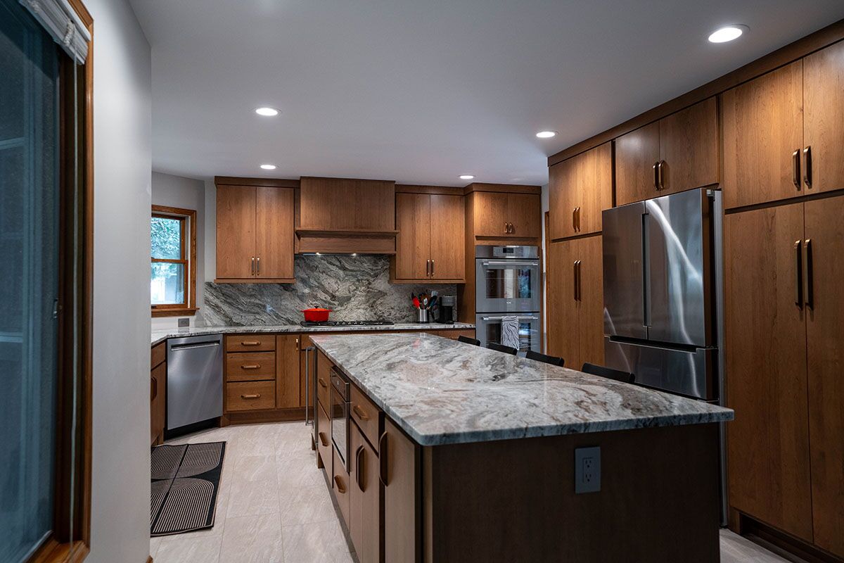 u-shaped kitchen with stained cabinets in haddon township nj